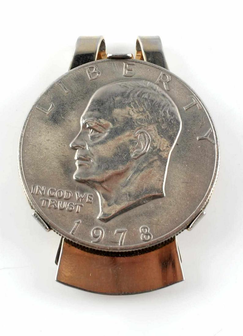 1978 U.S. EISNENHOWER DOLLAR IKE MONEY CLIP: A money clip with an Eisenhower dollar. Measures 1 1/2 x 2. Very good condtiion.