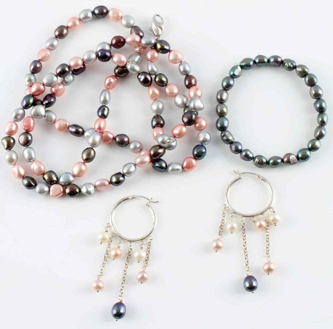 MULTICOLOR BAROQUE PEARL AND STERLING JEWELRY: 35 inch Honora Pearl necklace (8-9mm), multicolor Pink silver and black, Baroque, sterling clasp. 6 1/2 inch Tahitian Baroque pearl bracelet (8-9mm). One pair of sterling silver hoops with multi color