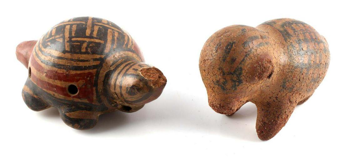 PRE COLUMBIAN TERRACOTTA ANIMAL WHISTLE & RATTLE: Terracotta turtle whistle, 4x2x2 1/2 inches, with flaked nose and forehead. Also terracotta bear or pig like mammal figure with rattling shards inside, heavily worn measuring 3x2x2 inches.