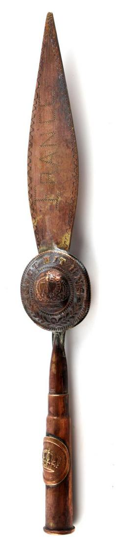 WWII TRENCH ART BRASS GOTT MIT UNS LETTER OPENER: France etched to 4 inch blade, crown wreath design to center and shell bottom. Entire length is 8 3/8 inches. Good condition.