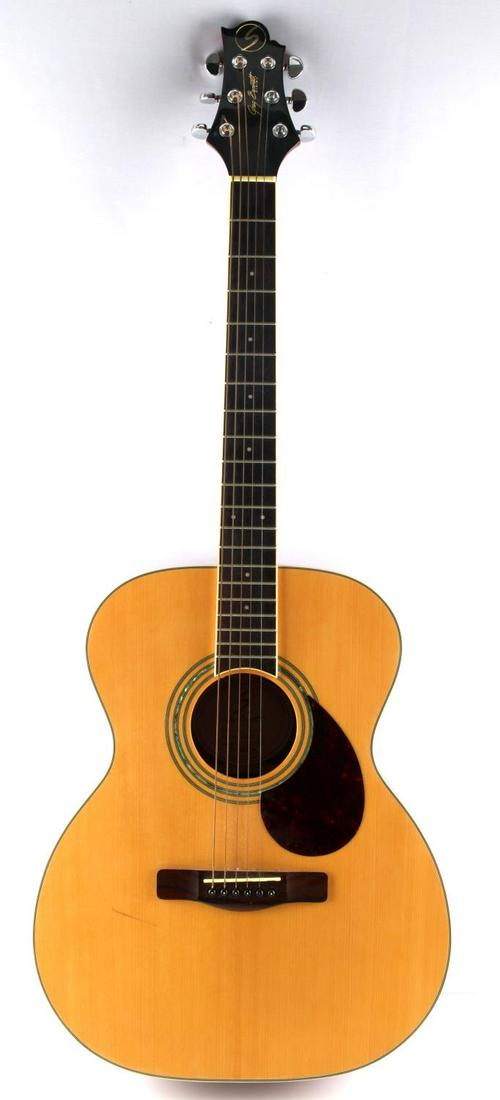 SAMICK GREG BENNETT ACOUSTIC GUITAR OM-5: Orchestra Model body. Solid Spruce top, Mahogany back and sides. Nato Mahogany neck. Rosewood fingerboard (12” radius). Nut width 1 11/16”. 20 fret, 25 1/2”scale. Dot inlay, 5-ply cream bindingG