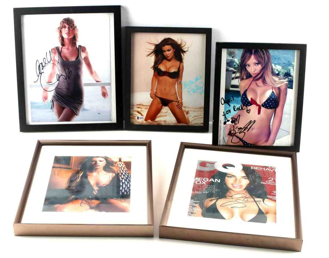 ACTRESS AUTOGRAPH LOT OF 5 CARMEN MEGAN TARA TILA: Lot includes autographs from Tara Reid, Tila Tequila, Megan Fox, Carmen Electra, and Taylor Swift. Measurements range 11x9 - 14 1/2x11 1/2. Unauthenticated, sold as is.