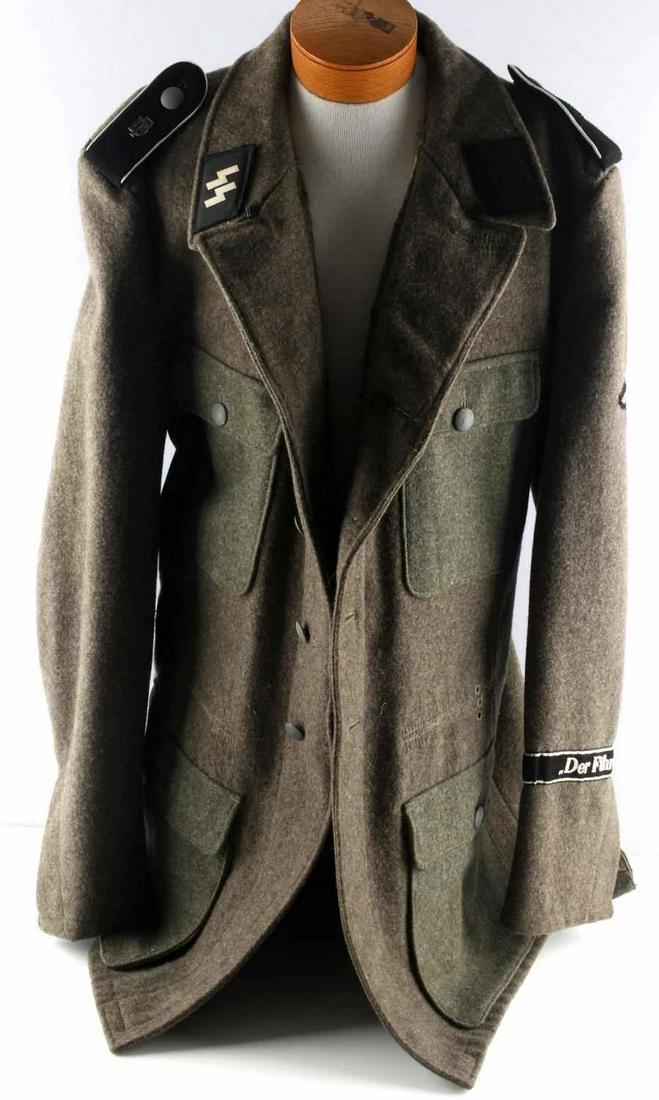 WWII GERMAN THIRD REICH SS TUNIC DF SHOULDER BOARD: Third Reich SS tunic. Shoulder boards with DF. Parteiadler and "Der Furher" cuff title on left sleeve. SS collar tabs. Interior marked "50, 48, 102, 82, 64, SS Dachau 44. Minimal fluorescing. Unauthen