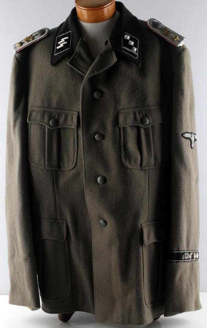 WWII GERMAN THIRD REICH SS OFFICER TUNIC PANZER: SS collar tab. Panzer shoulder boards. 3 pips and 2 stripes. Adolf Hitler cuff title and Parteiadler on left sleeve. Shoulder boards fluoresce. Tunic does not fluoresce. No internal markings. Unauthen