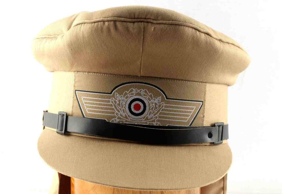 WWII GERMAN THIRD REICH HERMANN AFRIKA VISOR: Third Reich Herman Meyer Afrika Korps officer visor. Size 58. No interior markings. Does fluoresce under UV light. Very fine condition. Unauthenticated, sold as is.