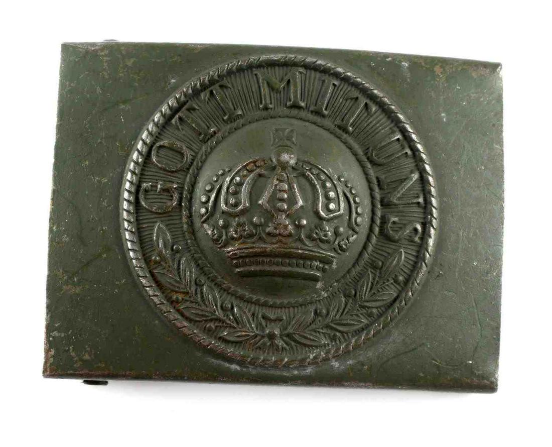 WWII THIRD REICH PRUSSIAN ENLISTED MAN BELT BUCKLE: WWII Prussian army enlisted man's belt buckle with "GOT MIT UNS" design on front measuring at 2 3/8 inches wide by 2 inches tall. Includes two prongs and belt hook on reverse side. Unauthenticated, so