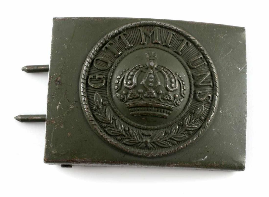 WWII THIRD REICH PRUSSIAN ENLISTED MAN BELT BUCKLE: WWII Prussian army enlisted man's belt buckle with "GOT MIT UNS" design on front measuring at 2 3/8 inches wide by 2 inches tall. Includes two prongs and belt hook on reverse side. Unauthenticated, so