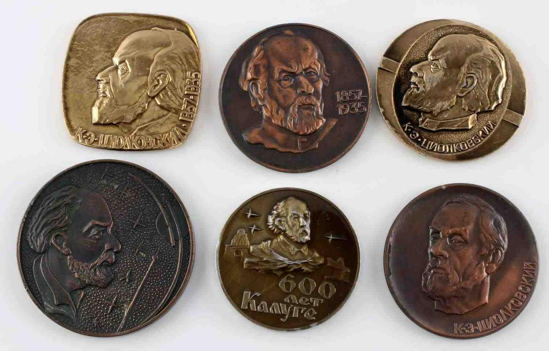 LOT OF 6 SOVIET SPACE PRESENTATION TABLE MEDALS: Lot of 6 Soviet space presentation table medals. Varying sizes with the largest measuring 2.5 inches in diameter and the smallest being 2 inches in diameter. Overall, very good condition. Unauthentica