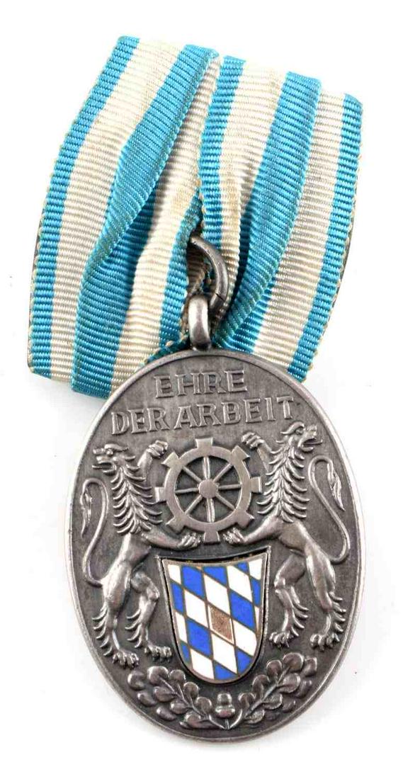 WWII BAVARIAN 25 YEAR LOYAL INDUSTRY SERVICE MEDAL: A World War 2 Bavarian 25 year loyal industry medal. Very good condition. Does not fluoresce. Measures 1 3/4 inches. This lot has a reserve.