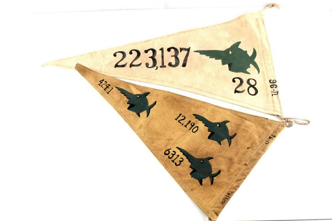 LOT 2 WWII THIRD REICH GERMAN U BOAT PENNANT FLAGS: Lot of 2 Third Reich flag pennant flags measuring approximately 24 x 13 inches. Minimal fluorescing. Very good condition. Unauthenticated, sold as is.