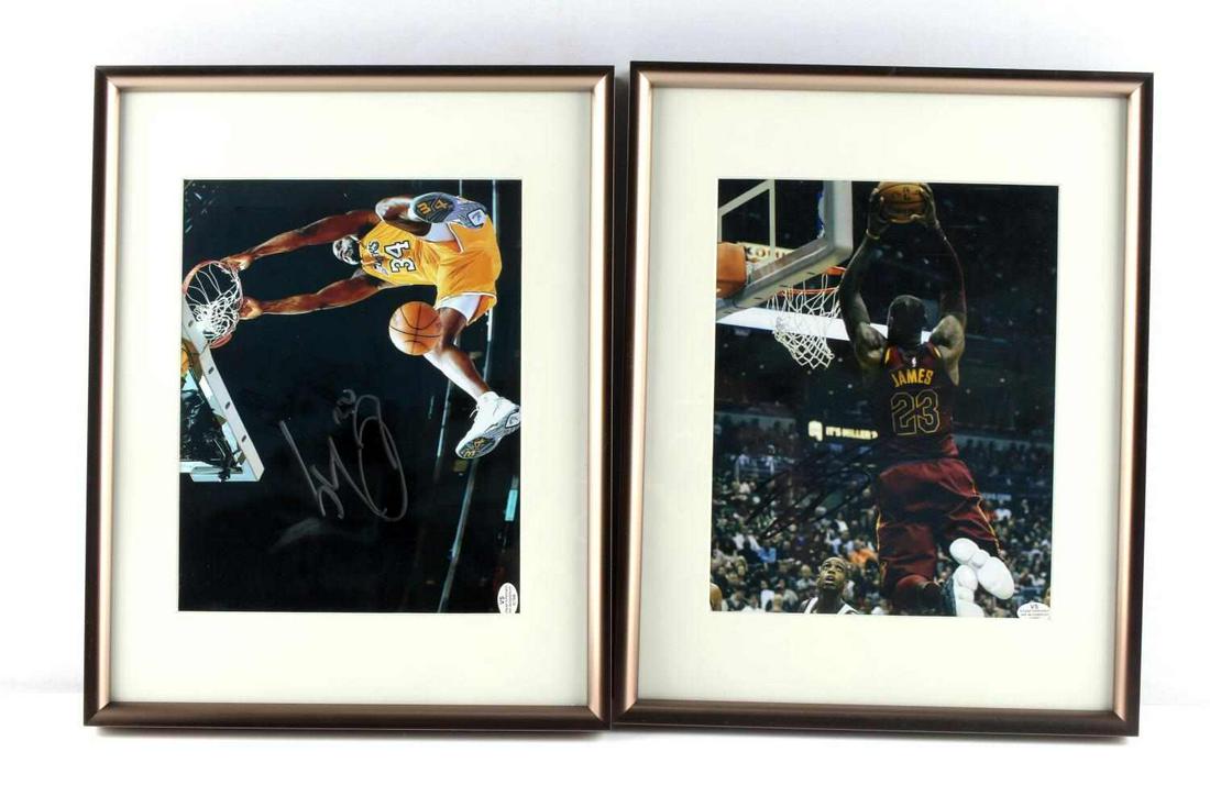 2 SHAQUILE O NEAL AND LEBRON JAMES AUTOGRAPHS: Lot includes a framed Shaquille O'Neal signed print (11 1/2 x 14 1/2 inches) and a framed Lebron James signed print (14 1/2 x 11 1/2). No COA. Deemed authentic according to terms.