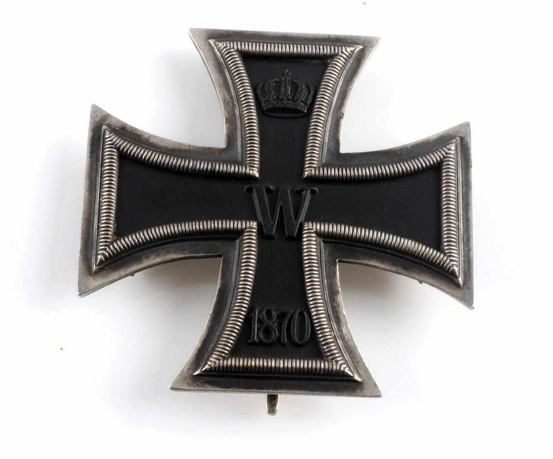 FRANCO PRUSSIAN WAR 1ST CLASS GERMAN IRON CROSS: 1870 Franco-Prussian war 1st class German imperial iron cross. Features a "W", "1870", and an imperial German crown marked on the front. The reverse side is marked "I.WAGNER & S." & "14 LOTH". Reverse