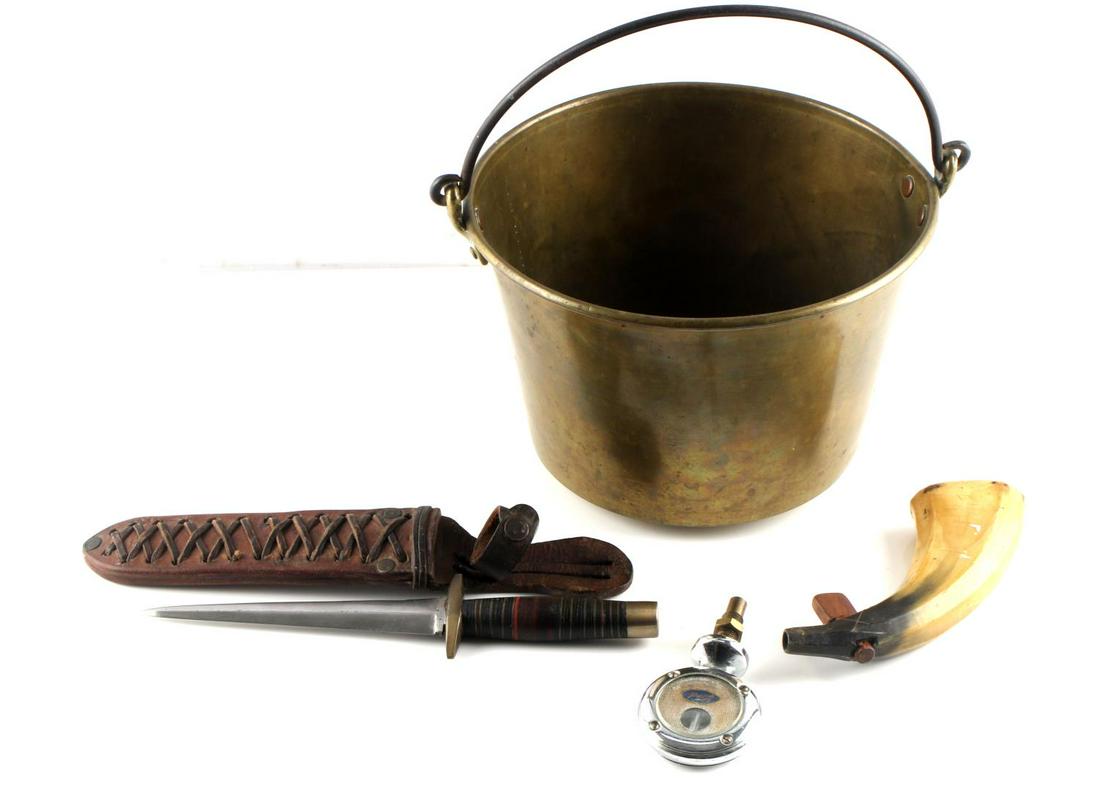 GENERAL MILITARY STILETTO KNIFE FORD BRASS BUCKET: Lot includes a stiletto knife with a leather case (11 1/2 inches), an old Ford hood mounted temperature gauge (2 1/4 x 4 1/4), a tusk for gun powder (7 x 2 1/2), and a brass bucket (9 1/2 inches diame