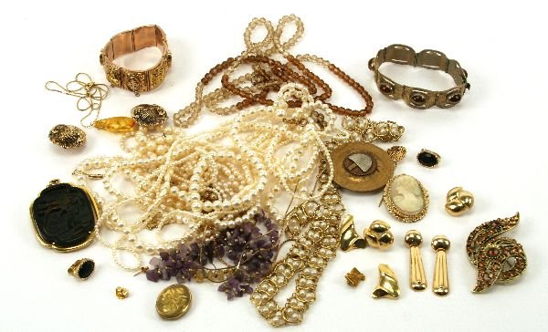 CULTURED PEARL & GOLD NECKLACE CAMEO PIN JEWELRY: Lot contains: 3 cultured pearl necklaces with 14K gold clasps, a cultured pearl necklace with 10K gold clasp, a Marjorie Baer mixed metal pin, a cameo pin, a Trifari pin/pendant, and a large assortmen