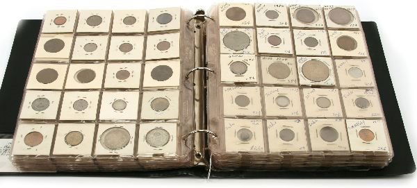 375+ DEALER LOT BINDER OF FOREIGN COINS: A dealer lot of 375 or more world coins from a huge variety most 19th 20th century, but a few earlier coins noted, Russia, France, United Kingdom, Canada, Cuba, India, Iran, Iraq, Indonesia, and many