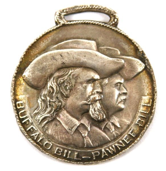 BUFFALO BILL PAWNEE BILL MASONIC WATCH FOB 1909: White metal watch fob of 1.5 inches with both Buffalo Bill and Pawnee Bill to the face. The rear is engraved with "Annual visit, Mecca Temple May 7. 1909". The Mecca Temple Shriners, the birthplace of