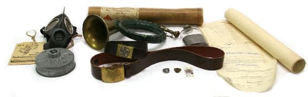 MIXED LOT OF ITEMS OF THIRD REICH INTEREST: MIXED LOT OF ITEMS OF THIRD REICH INTEREST A good mixed lot to include: A junior, Hitler youth belt and buckle. A civilian gas mask in its original box. A presentation glass flask with luftwaffe eagle