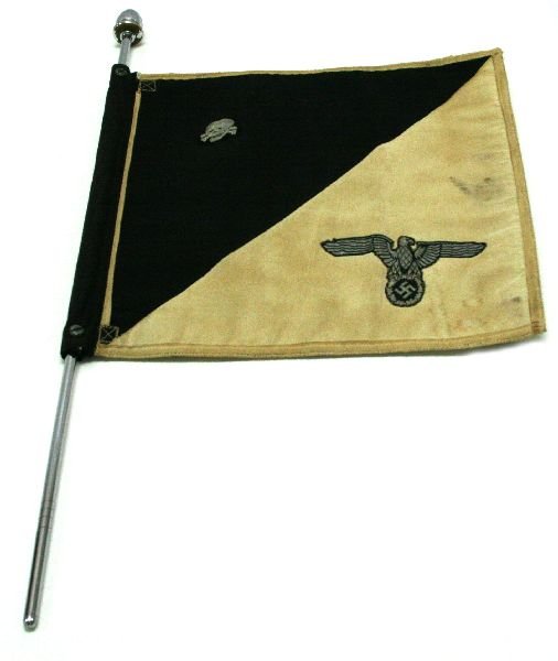 THIRD REICH SS OFFICERS CAR PENNANT: THIRD REICH SS OFFICERS CAR PENNANT Good quality, double sided pennant/flag on a metal stem. One side showing the SS runes, the other with eagle and deathshead insignia. 12 x 12 inches. EST. $1000 - 1