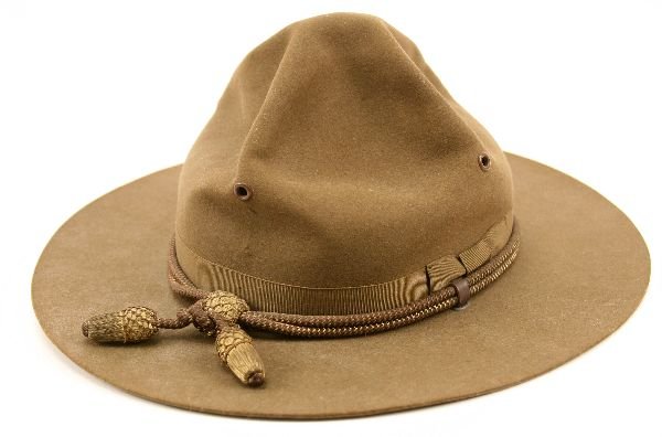 M1911 US ARMY GENERAL OFFICERS CAMPAIGN HAT: M1911 US ARMY GENERAL OFFICERS CAMPAIGN HAT Brown felt hat by John B Stetson Company. Leather sweatband. Gold bullion wire chords intertwined with brown cotton. Minor moth traces to the underside but 