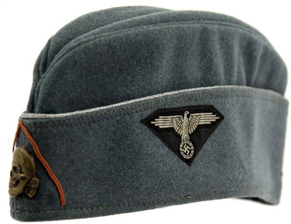 THIRD REICH SS OFFICERS FIELD CAP: THIRD REICH SS OFFICERS FIELD CAP Field green side cap with silver piping, BeVo eagle to the side, brass skull and crossbones and orange Waffenfarbe (Replacement Services, Engineer Officers). Light gr