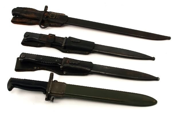BAYONET LOT OF 4 - GERMAN USA JAPAN: BAYONET LOT OF 4 - GERMAN USA JAPAN To include: Japanese type 30, in its scabbard and with leather frog, GC. M1 Garand VGC. WWI German K98, the blade blued for WWII use with frog, Blade and scabbard w