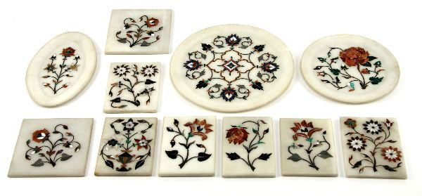 ALABASTER SEMI-PRECIOUS STONE PLATE & TILE LOT 11: ALABASTER SEMI-PRECIOUS STONE PLATE & TILE LOT 11 An intricate collection of various sized plates and tiles cut from alabaster with inlayed floral designs of lapis, malachite, mother of pearl, agate a