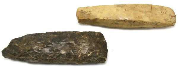 DANISH NEOLITHIC SQUARE BUTTED AXE BLADE LOT: DANISH NEOLITHIC SQUARE BUTTED AXE BLADE LOT A pair of Danish blades from the Scott Young collection 1 of grey flint measuring 10 inches with some damage at the butt, Mr. Young's records provenance th