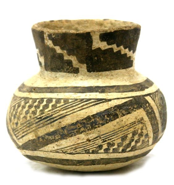 ANASAZI PRE COLOMBIAN POTTERY VESSEL: ANASAZI PRE COLOMBIAN POTTERY VESSEL An original pre-Colombian Anasazi pottery vessel standing 5 inches with a 16 inch diameter midway, an as found vessel with no repairs in very good condition. EST. 