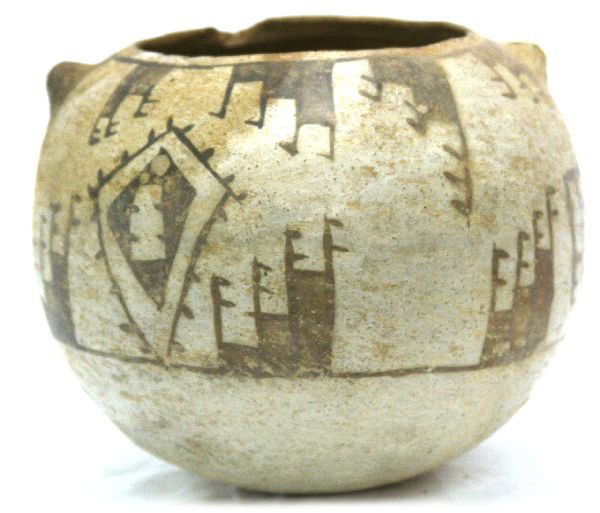SOUTHWESTERN PRE COLOMBIAN CHACO SEED POT VESSEL: SOUTHWESTERN PRE COLOMBIAN CHACO SEED POT VESSEL A Chaco culture decorated pre-Colombian pottery vessel atypical black and white decoration, carrying holes east and west of its opening, damage at 11:0