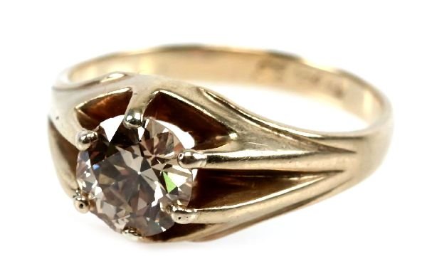 MENS 1.55 CT DIAMOND RING 14K GOLD: MENS 1.55 CT DIAMOND RING 14K GOLD A mens 14K yellow gold ring with a 1.55 ct "Old European" cut diamond. Diamond is I-1 clarity with a slight yellowish brown color. Diamond has a chip that does not a