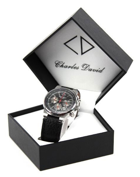 MENS MAGMA SS WRISTWATCH W/ BUFFALO LEATHER BAND: MENS MAGMA SS WRISTWATCH W/ BUFFALO LEATHER BAND A men's Charles David Magma SS chronograph wristwatch with stainless steel case measuring 39 mm, quartz movement, authentic carbon fiber dial, premium