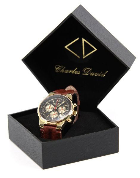 MENS MAGMA GSS WRISTWATCH W/ RALLEY LEATHER BAND: MENS MAGMA GSS WRISTWATCH W/ RALLEY LEATHER BAND A men's Charles David Magma GSS chronograph wristwatch with 18K gold ion plated case measuring 39 mm, quartz movement, authentic carbon fiber dial, pre