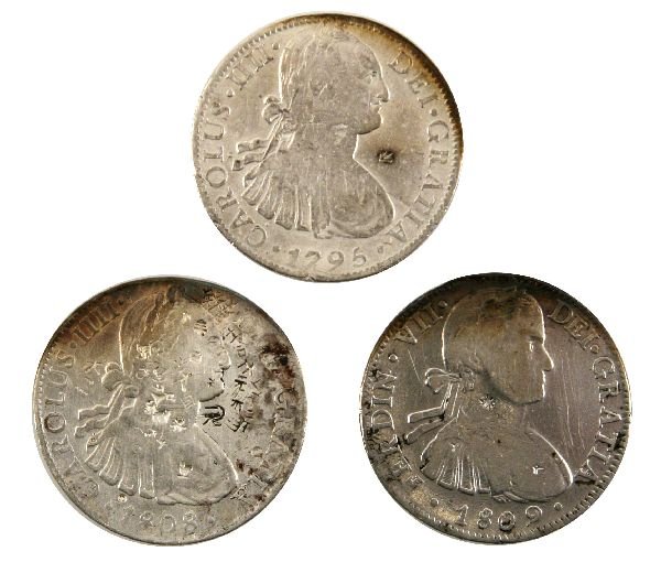 CHARLES IV PILLAR DOLLAR 8R LOT OF 3 W COA: CHARLES IV PILLAR DOLLAR 8R LOT OF 3 W COA A interesting grouping of 3 Spanish pillar dollars 1808, 1795, and 1809, the coins come with the original Montgomery Wards order form from a promotion of "th