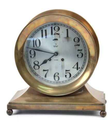 TIFFANY & CO. NEW YORK SHIPS BELL CLOCK: A Working Tiffany & Co. New York Ship's Bell clock 9 inch diameter face standing 12 inches, clear bell at the hour and half, at this writing it was keeping accurate time but if acquired servicing shou