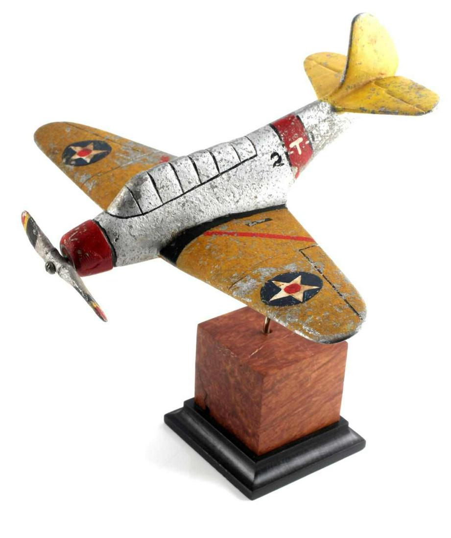WWII TRENCH ART FIGHTER AIRPLANE MODEL: Aluminum model on later added stand, 6 1/2 by 9 inches, very good period example.