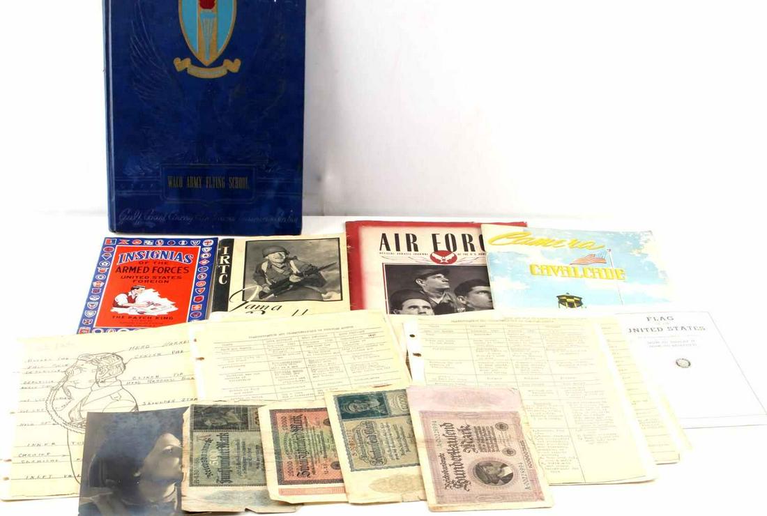 WWII WACO FLYING SCHOOL YEARBOOK & EPHEMERA: Mixed lot includes: Waco Flying School yearbook, IRTC I am a Doughboy booklet, Insignias of the Armed Forces patch booklet, printed pages of chemical agents used in warfare, USAF journal 1943, Camera 