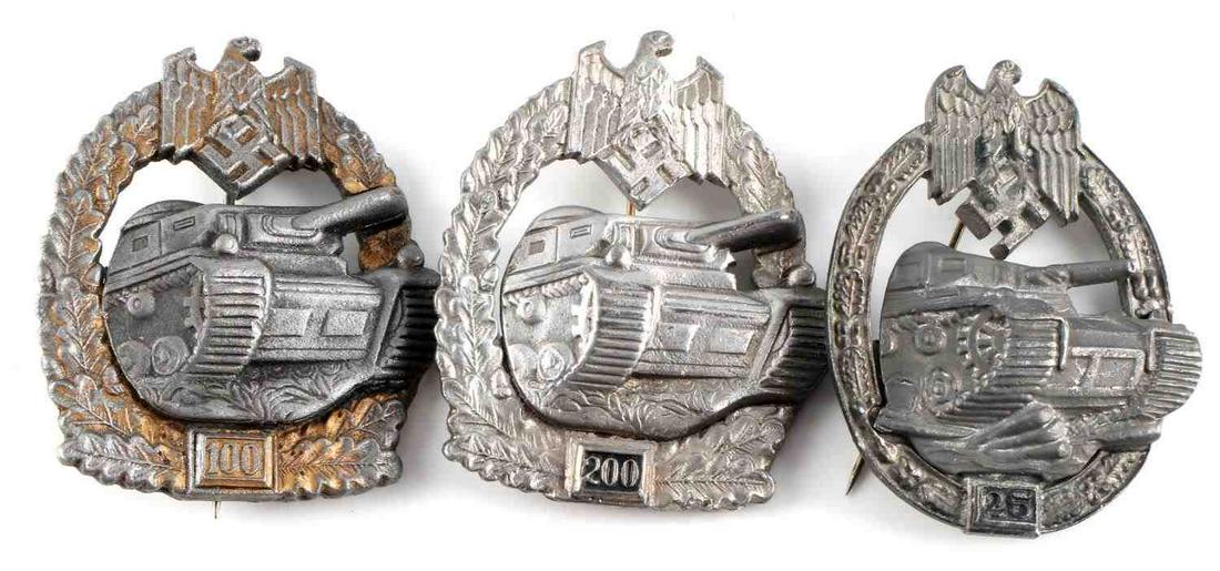 LOT OF 3 WWII GERMAN THIRD REICH PANZER BADGES: Lot includes 3 Third Reich Panzer engagement badges for 25, 100, and 200 engagements. Very good condition. Measures 2 1/4 inches diameter. Unauthenticated, sold as is.