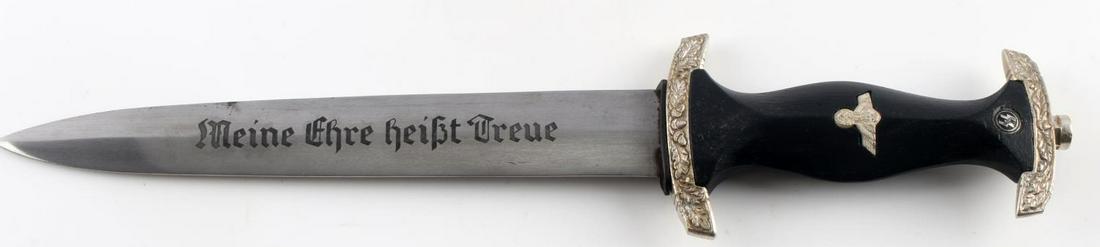 WWII GERMAN SS HIMLER HONOR DAGGER: WWII German Third Reich Himmler honor dagger measuring 13 9/16 inches long in total. Blade features Henrich Himmler facsimile signature, has makers mark which reads ""Hermann Hann Sol Wald", blade als