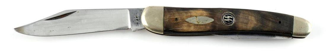 WWII GERMAN THIRD REICH WAFFEN SS POCKET KNIFE: WWII German Waffen SS pocket knife. "Rostfrei" maker's marked on the blade. SS insignia on center of the handle. Measures 4 inches closed. Very good condition. Unauthenticated; sold as is. This lot ha