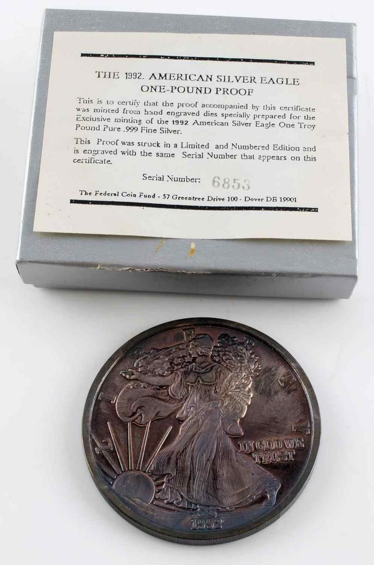 1 TROY POUND SILVER COIN AMERICAN EAGLE PROOF: 1 Troy Pound (12 troy oz) 1992 American Silver Eagle Proof , .999 Fine Silver Coin with case toning throughout and Federal Coin Fund Certificate of Authenticity.