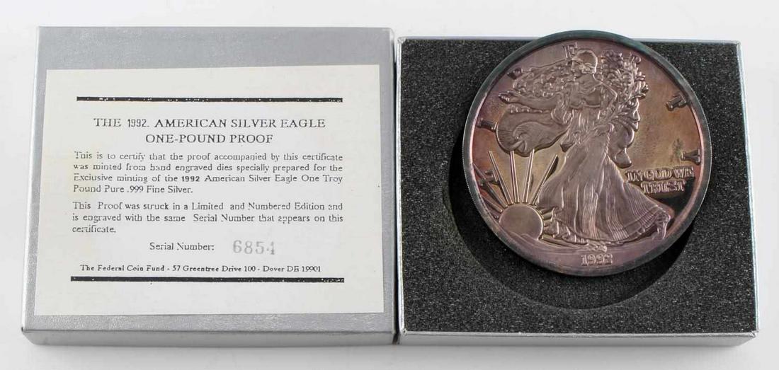1 TROY POUND SILVER COIN AMERICAN EAGLE PROOF: 1 Troy Pound (12 troy oz) 1992 American Silver Eagle Proof , .999 Fine Silver Coin with case toning throughout and Federal Coin Fund Certificate of Authenticity.