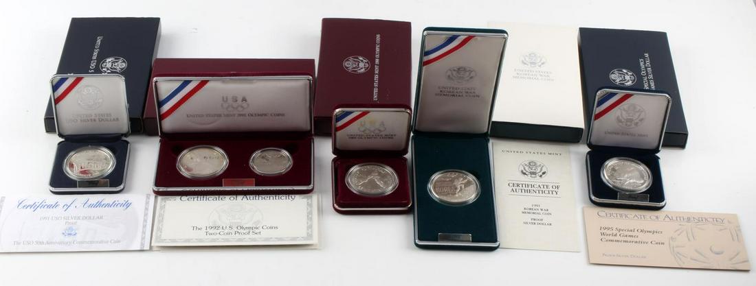 5 DIFFERENT COMMEMORATIVE COIN SETS OLYMPIC KOREA: All sets are as issued by the mint, includes 1988 Olympics, 1995 Special Olympics, 1992 Olympics, USO silver dollar, and Korean war Memorial coin,