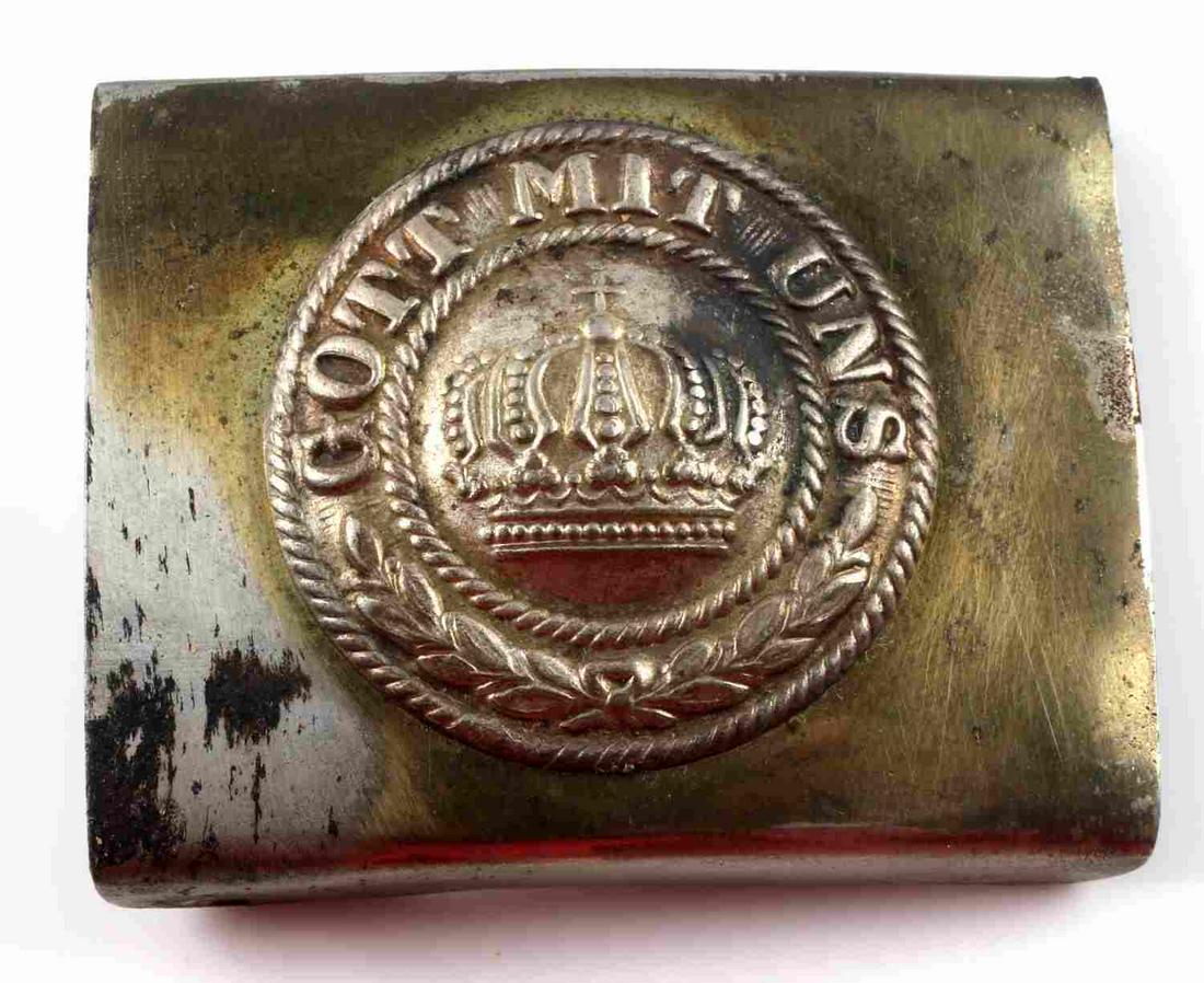 WWI IMPERIAL GERMAN BELT BUCKLE STEEL: Gott Mit Uns with oak leaves below, and crown at center. Some finish loss and oxidation. Overall good condition. Unauthenticated, sold as is.