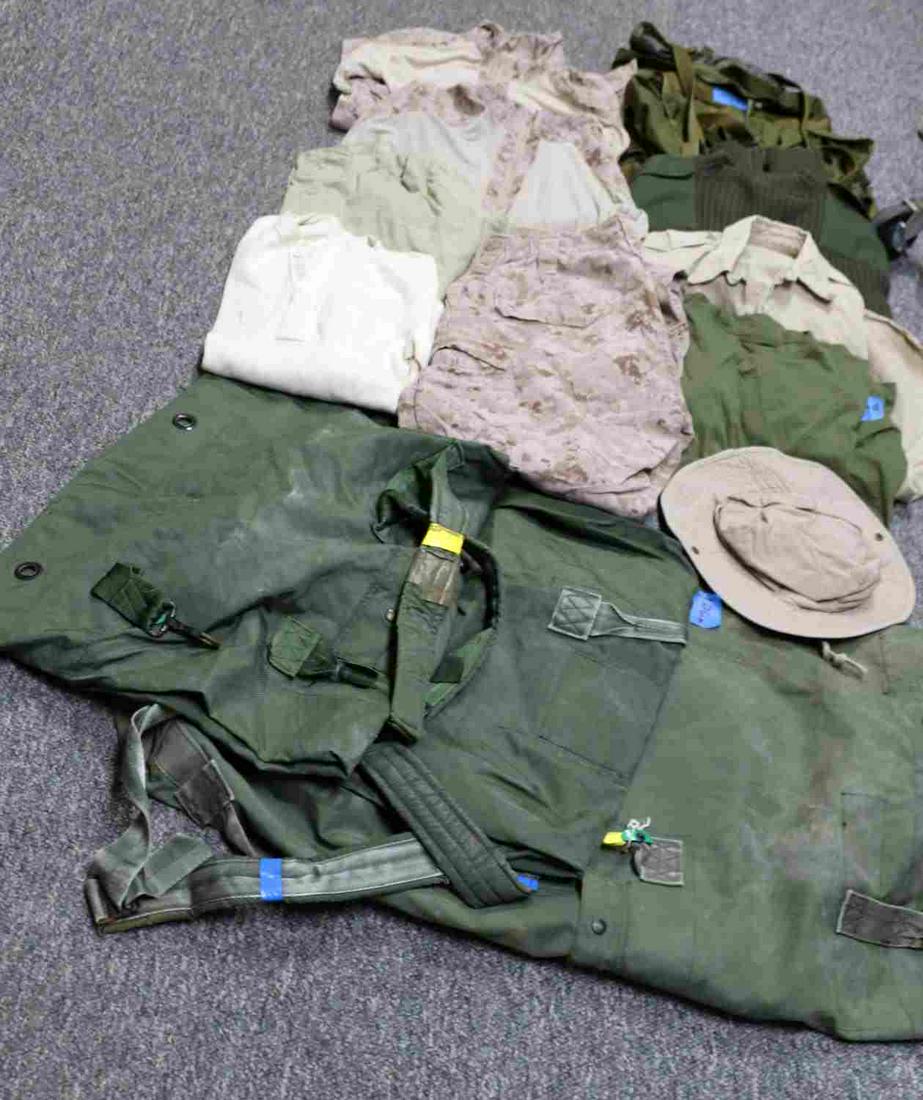 13 US MARINES USMC IRAQ DESERT DIGI CAMO GEAR LOT: One (1) US Marines desert camo pants. Size-M-R. Two (2) Desert Camo field/service shirts. Size S-R. One (1) Tan button down cold weather shirt. One (1) athletic green shirt. Size M. One (1) Desert tan