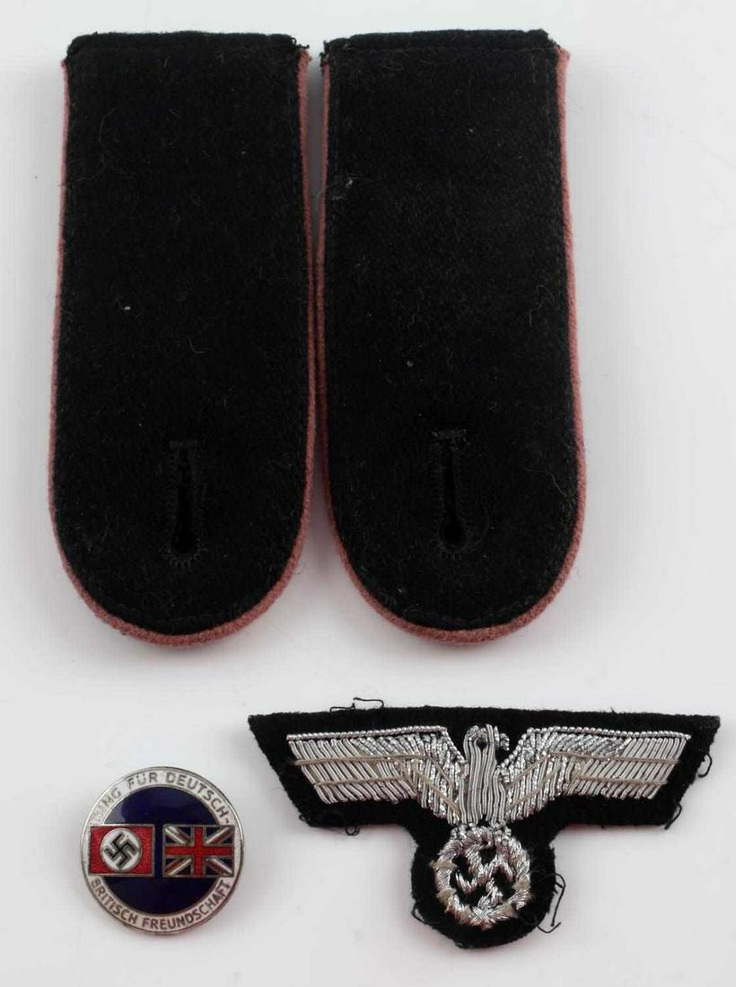 WWII THIRD REICH GERMAN INSIGNIA LOT PIN BOARDS: Lot of 3 includes: silver bullion over cloth cap eagle, WWII German British Friendship pin, maker marked, and a pair of Wehrmacht Panzer wrap shoulder boards. Very good condition. Unauthenticated, sol