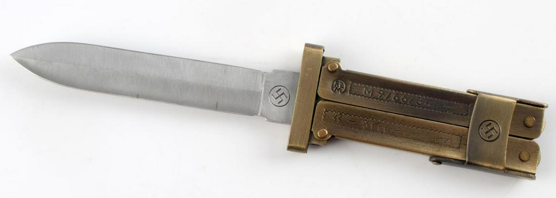 WWII THIRD REICH GERMAN SS PARATROOPER KNIFE: Foldable paratrooper knife with a 3 7/8 inch blade, marked China, RZM and other markings etched to front. When closed, measures just under 6 inches. Good condition. Sold as is.