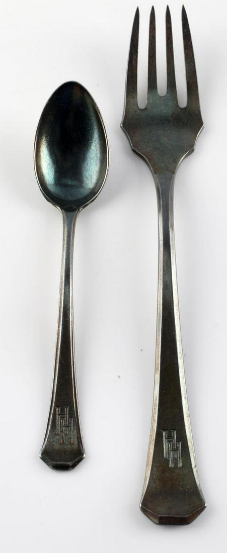 WWII GERMAN HENRICH HIMMLER ENGRAVED FORK & SPOON: WWII German Henrich Himmler engraved fork and spoon. "HH" engraved on the handles. The spoon measures 5 inches long, fork 7 inches. Very good condition overall on both pieces of silverware. Unauthenti