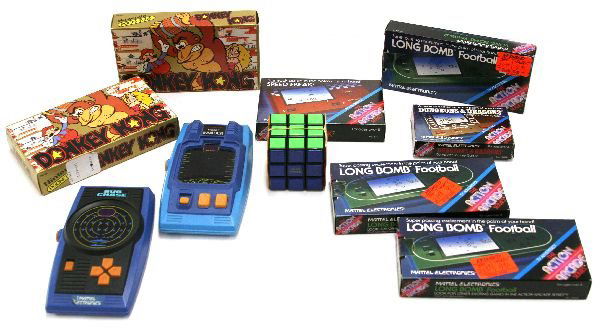 VINTAGE HANDHELD VIDEO GAME LOT DONKEY KONG & MORE: 69078 VINTAGE HANDHELD VIDEO GAME LOT DONKEY KONG & MORE Lot includes 9 vintage handheld video games. (2) 1982 pocketsize Nintendo Donkey Kong multi-screen game and watch; both are in original boxes,