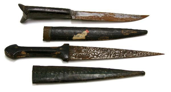 OTTOMAN EMPIRE KNIFE LOT OF 2: 69089 OTTOMAN EMPIRE KNIFE LOT OF 2 A Turkish "Kinjal" type knife with a 6.25 inch patterned blade. and a "Cretan" type with 5.5 inch blade and horn grips. Both with sheaths. $100-300
