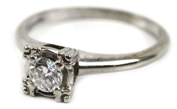 18K GOLD KEEPSAKE 1/3 CT DIAMOND ENGAGEMENT RIN: A vintage 18K white gold KeepSake diamond engagement ring. Approximately a 1/3 ct diamond solitaire. SI-1 clarity, I color. Size 6.25. Weighs 3.1 g.